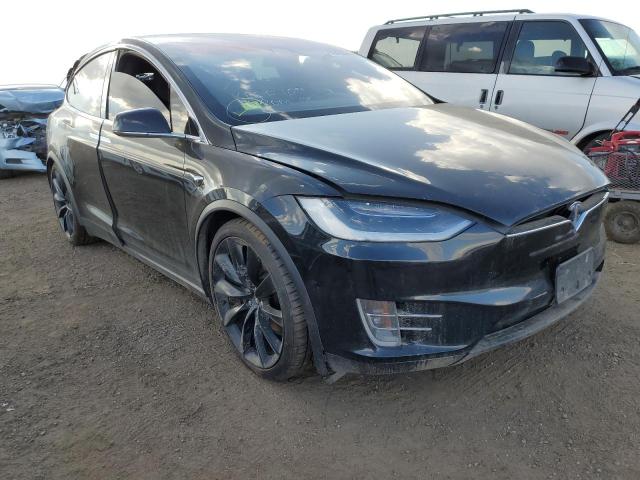 TESLA MODEL X 2017 with VIN 5YJXCDE23HF065493 - Photo from auction