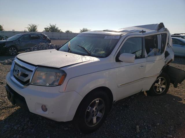 Photo 2 from auction – 2011 HONDA PILOT TOUR with VIN 5FNYF3H90BB026334