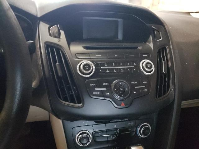 Photo 9 from auction – 2015 FORD FOCUS SE with VIN 1FADP3F20FL343301