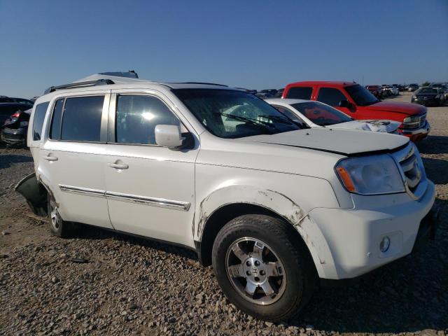 HONDA PILOT TOUR 2011 with VIN 5FNYF3H90BB026334 - Photo from auction