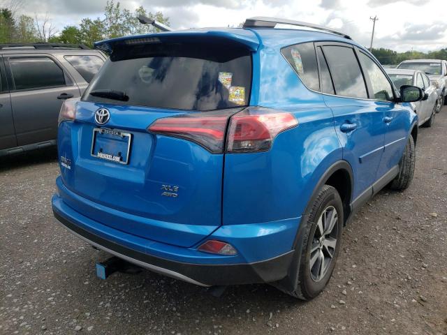 Photo 4 from auction – 2017 TOYOTA RAV4 XLE with VIN JTMRFREV5HD219961