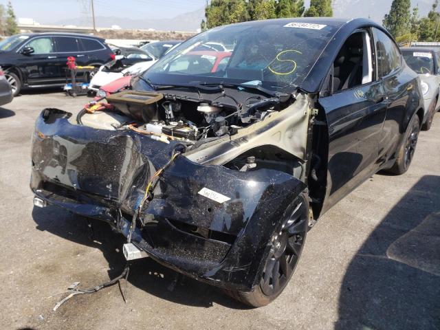 Photo 2 from auction – 2021 TESLA MODEL Y with VIN 5YJYGAEE8MF214086