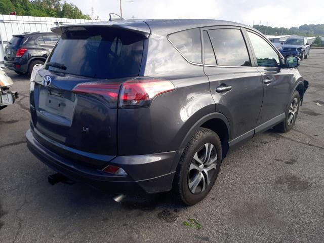 Photo 4 from auction – 2018 TOYOTA RAV4 LE with VIN 2T3ZFREV8JW473365