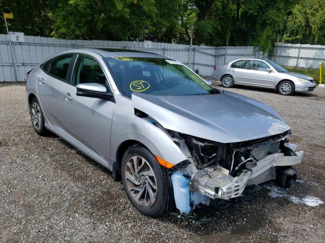 HONDA CIVIC EX 2017 with VIN 2HGFC2F8XHH026009 - Photo from auction