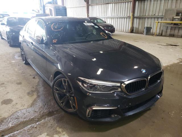 BMW M550XI 2018 with VIN WBAJB9C50JB036333 - Photo from auction
