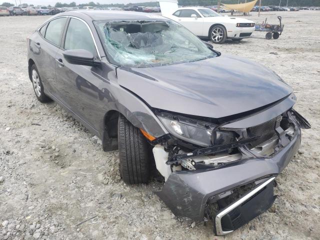 HONDA CIVIC LX 2019 with VIN 19XFC2F64KE039984 - Photo from auction