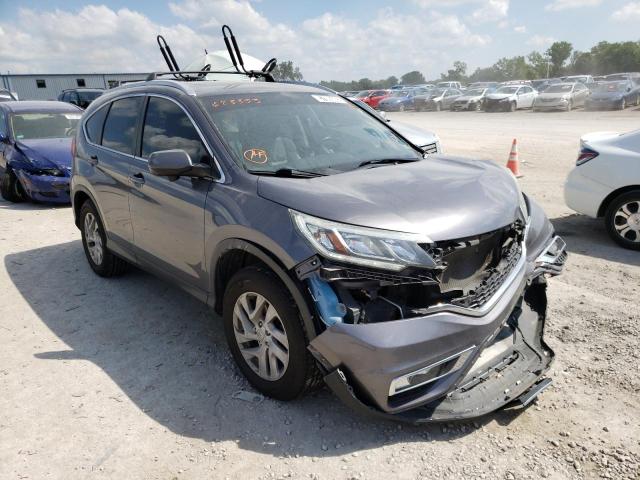 Photo 1 from auction – 2015 HONDA CR-V EXL with VIN 2HKRM4H73FH673333