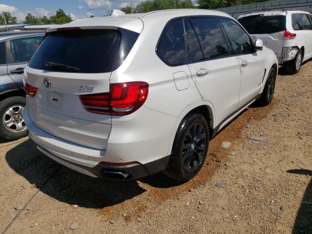 Photo 4 from auction – 2014 BMW X5 XDRIVE5 with VIN 5UXKR6C56E0C03055