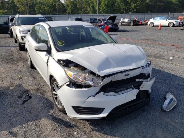 FORD FOCUS SE 2017 with VIN 1FADP3F27HL259723 - Photo from auction