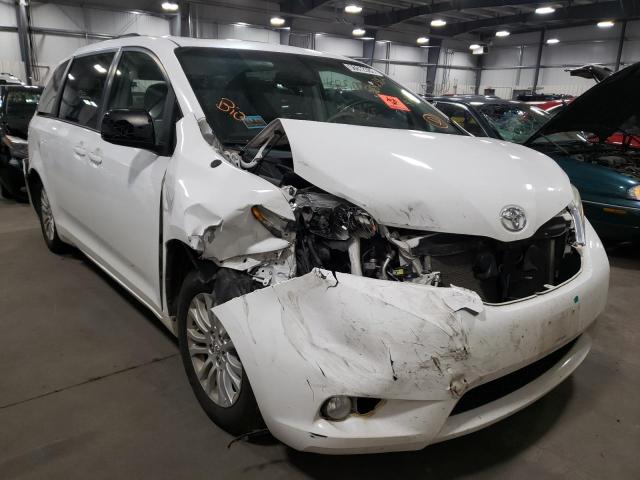 TOYOTA SIENNA XLE 2011 with VIN 5TDYK3DC9BS019990 - Photo from auction