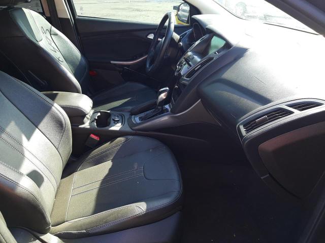 Photo 5 from auction – 2014 FORD FOCUS TITA with VIN 1FADP3J27EL276735