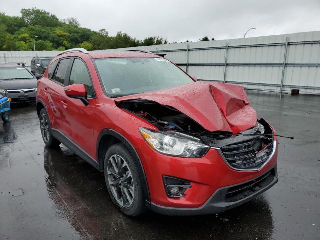 MAZDA CX-5 GT 2016 with VIN JM3KE4DYXG0876299 - Photo from auction