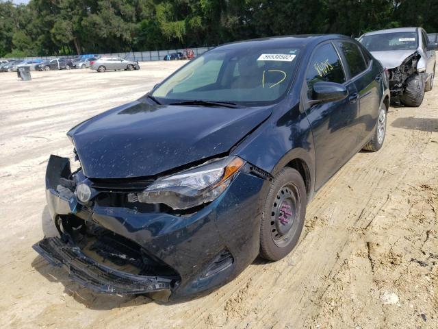 Photo 2 from auction – 2017 TOYOTA COROLLA L with VIN 5YFBURHE1HP600318