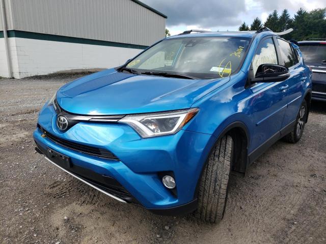 Photo 2 from auction – 2017 TOYOTA RAV4 XLE with VIN JTMRFREV5HD219961