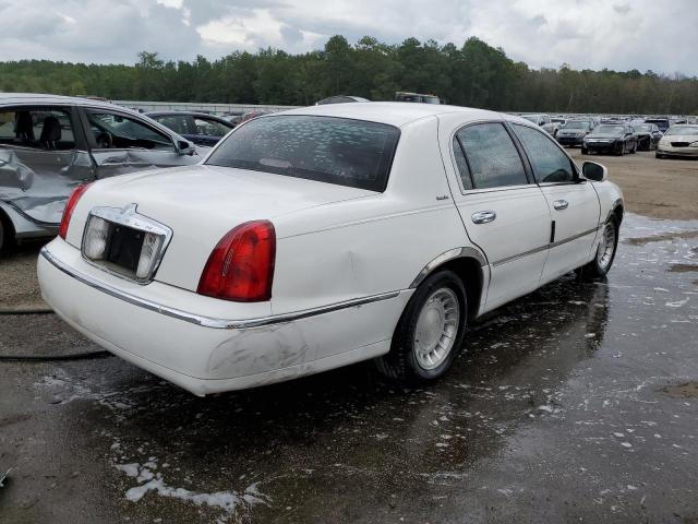 Photo 4 from auction – 2000 LINCOLN TOWNCAR with VIN 1LNHM81WXYY906724
