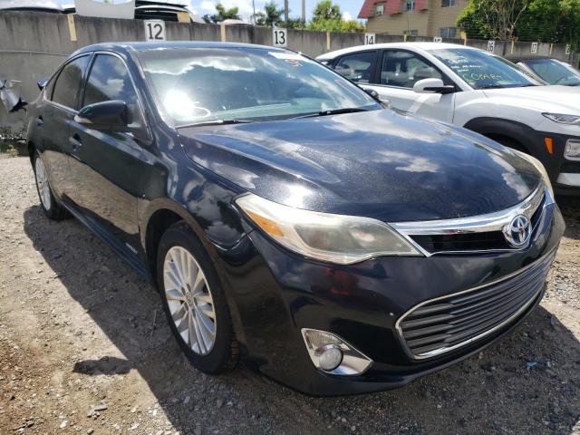 TOYOTA AVALON HYB 2014 with VIN 4T1BD1EB7EU029343 - Photo from auction