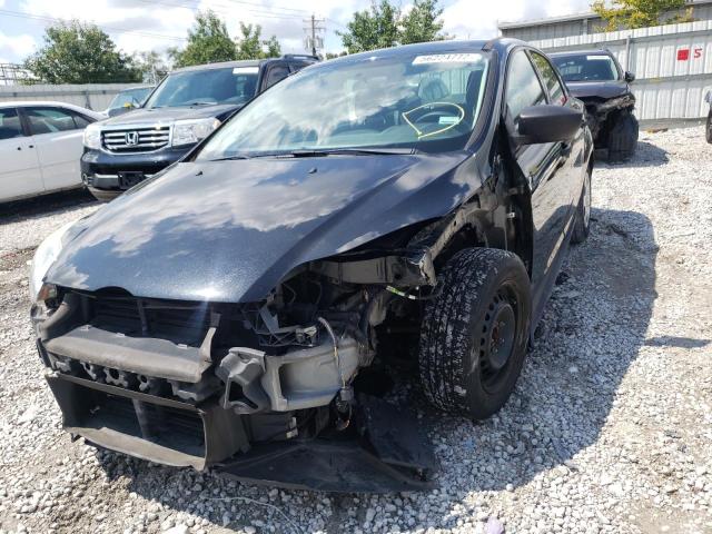 Photo 2 from auction – 2014 FORD FOCUS S with VIN 1FADP3E24EL352843