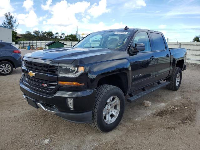 Photo 2 from auction – 2018 CHEVROLET SILVERADO with VIN 3GCUKREC1JG469386
