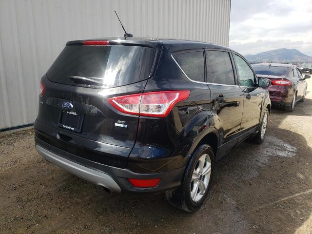 Photo 4 from auction – 2014 FORD ESCAPE SE with VIN 1FMCU9GX0EUD09858