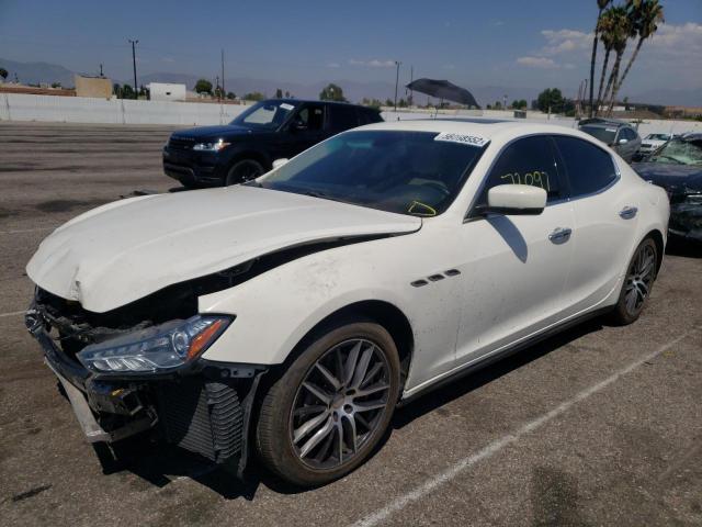 Photo 2 from auction – 2014 MASERATI GHIBLI with VIN ZAM57XSA7E1123257