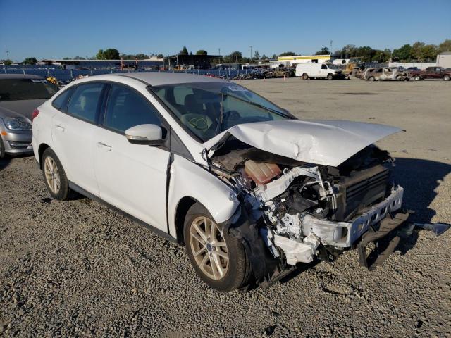 FORD FOCUS SE 2015 with VIN 1FADP3F23FL262034 - Photo from auction