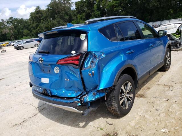 Photo 4 from auction – 2017 TOYOTA RAV4 XLE with VIN JTMWFREV6HD096092
