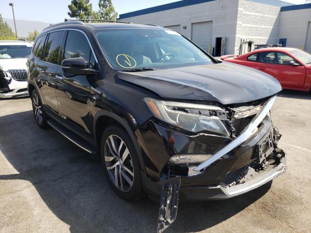 Photo 1 from auction – 2017 HONDA PILOT TOUR with VIN 5FNYF5H98HB044407