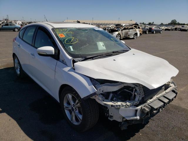 FORD FOCUS SE 2014 with VIN 1FADP3K28EL282333 - Photo from auction