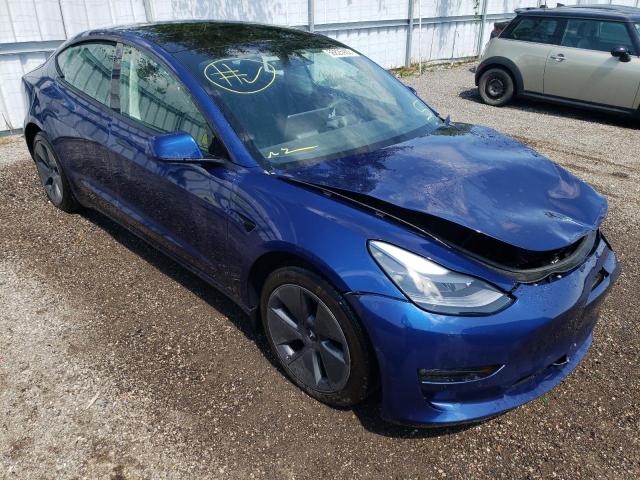 TESLA MODEL 3 2021 with VIN 5YJ3E1EB3MF979454 - Photo from auction