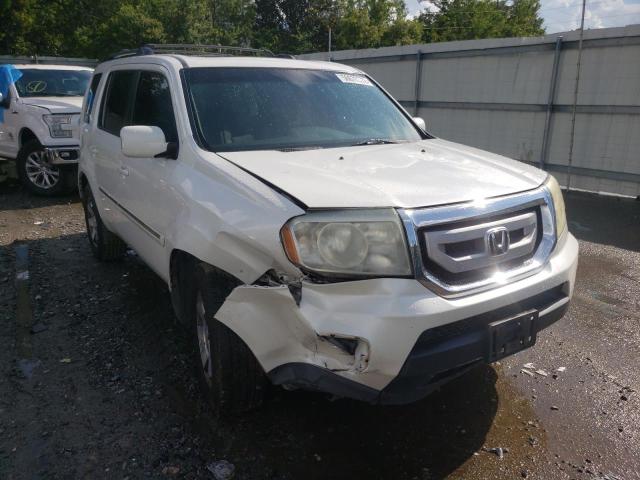 HONDA PILOT TOUR 2011 with VIN 5FNYF3H91BB002382 - Photo from auction