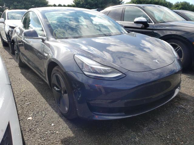 TESLA MODEL 3 2018 with VIN 5YJ3E1EB5JF144760 - Photo from auction