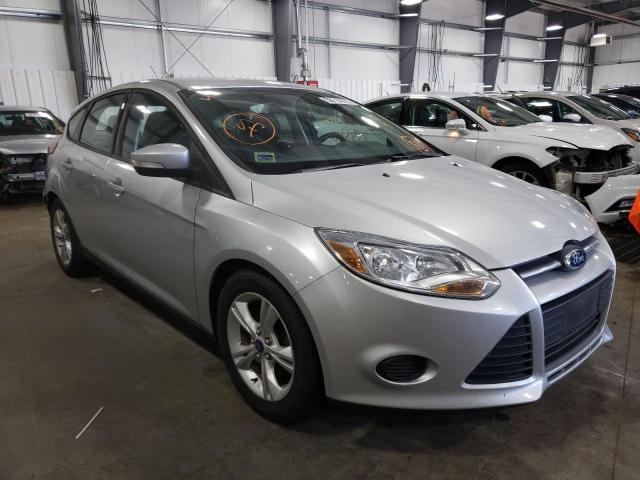 FORD FOCUS SE 2014 with VIN 1FADP3K22EL138504 - Photo from auction