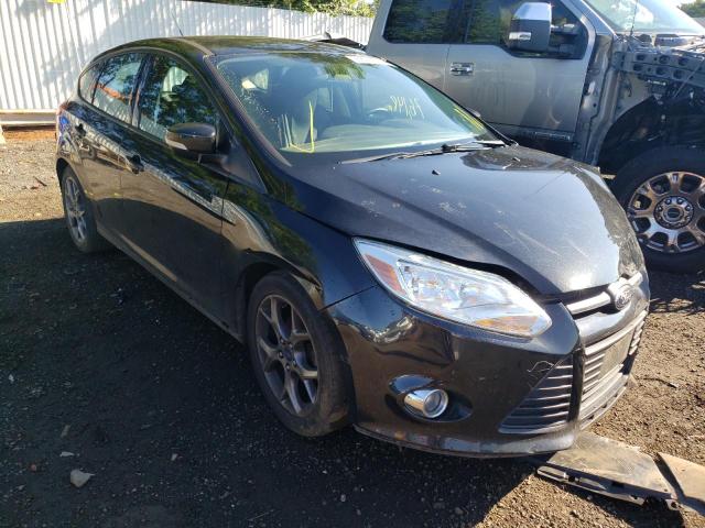 FORD FOCUS SE 2014 with VIN 1FADP3K23EL415824 - Photo from auction