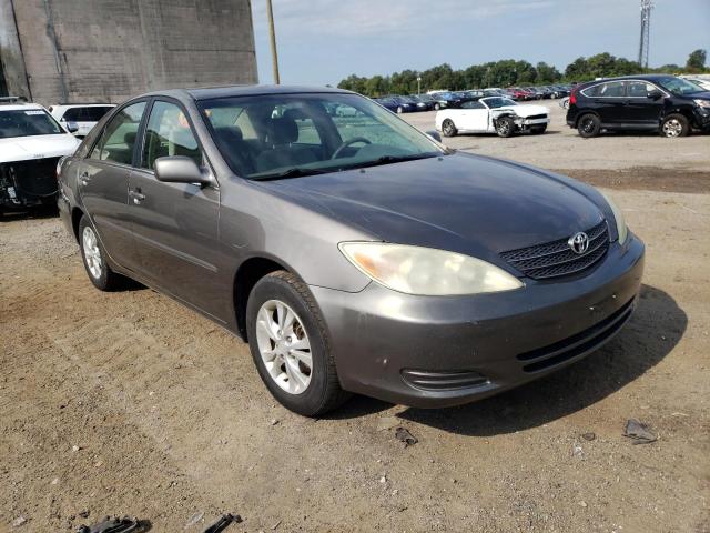 TOYOTA CAMRY LE 2004 with VIN 4T1BF32K64U572479 - Photo from auction