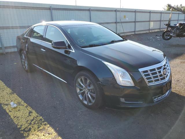 CADILLAC XTS 2013 with VIN 2G61W5S37D9209449 - Photo from auction