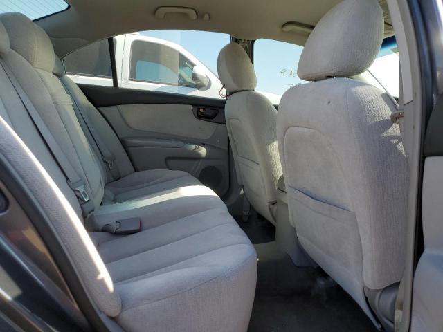 Photo 6 from auction – 2006 KIA OPTIMA LX with VIN KNAGE123965055424