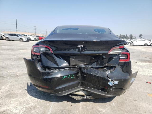Photo 9 from auction – 2021 TESLA MODEL 3 with VIN 5YJ3E1EA5MF929548