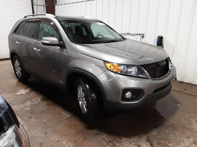 KIA SORENTO LX 2013 with VIN 5XYKTCA68DG390804 - Photo from auction