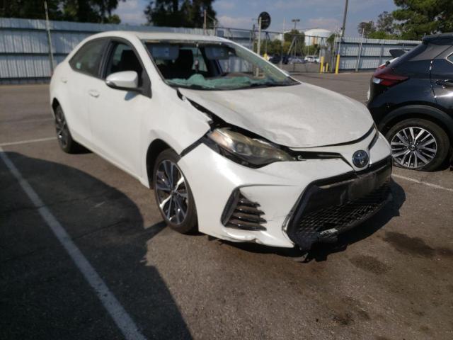 TOYOTA COROLLA L 2017 with VIN 5YFBURHE4HP623589 - Photo from auction