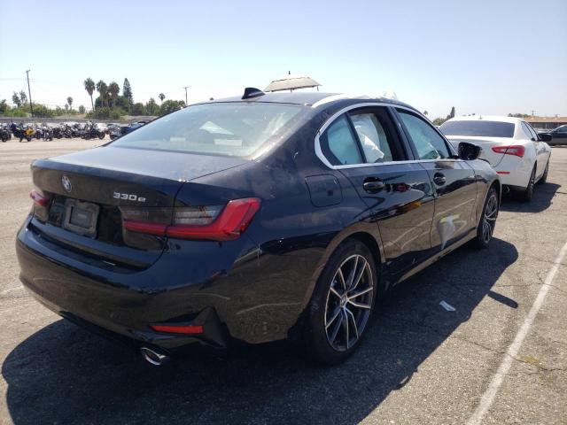 Photo 4 from auction – 2021 BMW 330E with VIN WBA5P7C02MFK96855