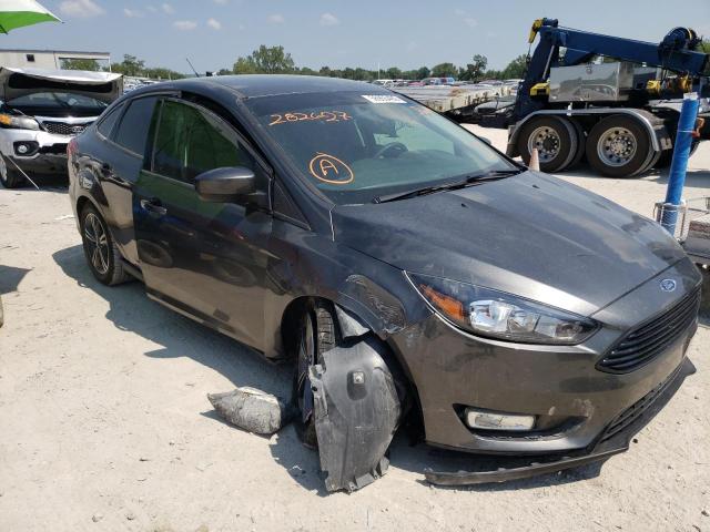 FORD FOCUS SE 2018 with VIN 1FADP3FE5JL282627 - Photo from auction