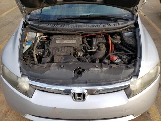 Photo 7 from auction – 2006 HONDA CIVIC HYBR with VIN JHMFA36266S026809