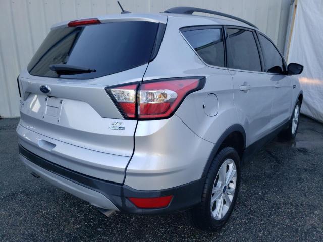 Photo 4 from auction – 2018 FORD ESCAPE SE with VIN 1FMCU9G96JUB49142