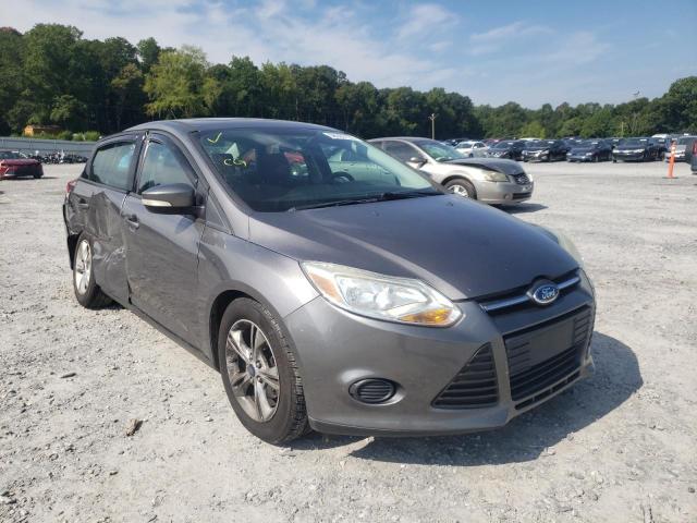 FORD FOCUS SE 2014 with VIN 1FADP3F29EL436137 - Photo from auction