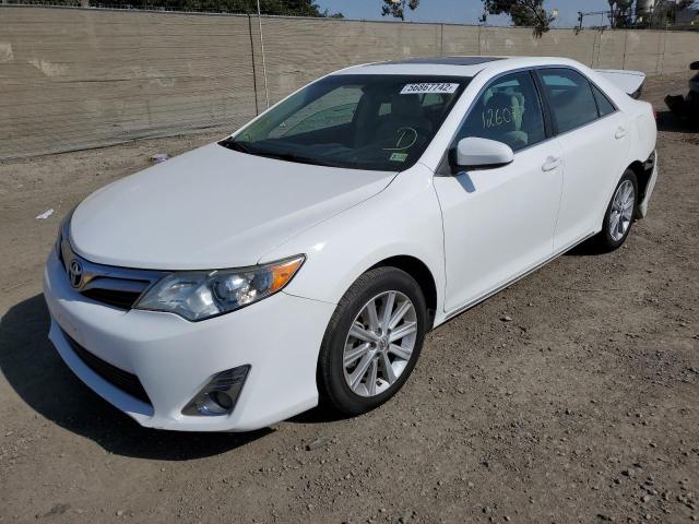Photo 2 from auction – 2014 TOYOTA CAMRY L with VIN 4T4BF1FK0ER411891