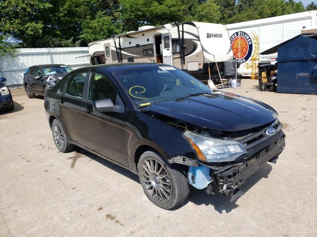 FORD FOCUS SES 2011 with VIN 1FAHP3GNXBW114594 - Photo from auction