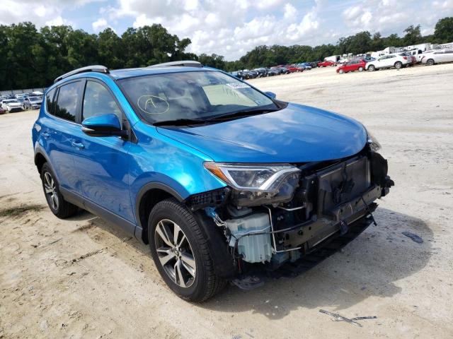TOYOTA RAV4 XLE 2017 with VIN JTMWFREV6HD096092 - Photo from auction