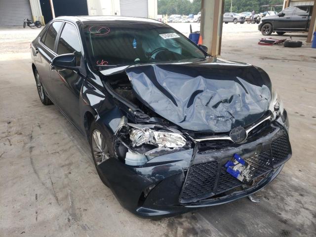 TOYOTA CAMRY LE 2017 with VIN 4T1BF1FK0HU386182 - Photo from auction