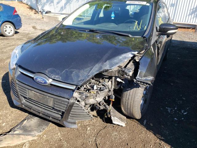 Photo 9 from auction – 2014 FORD FOCUS SE with VIN 1FADP3K23EL415824