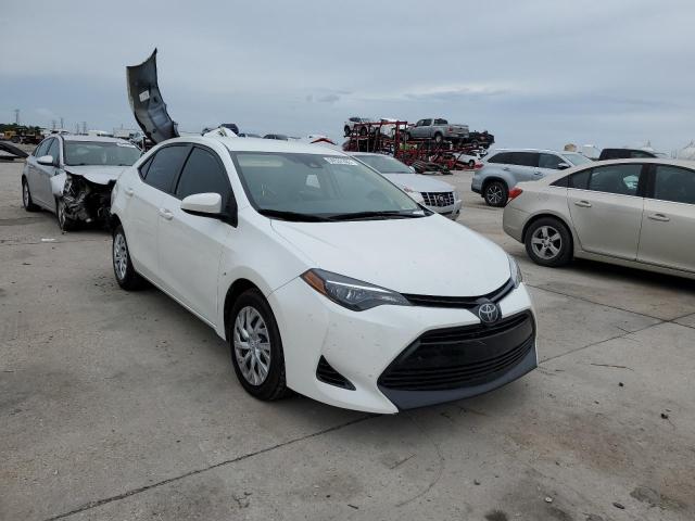 TOYOTA COROLLA L 2018 with VIN 5YFBURHE7JP749595 - Photo from auction